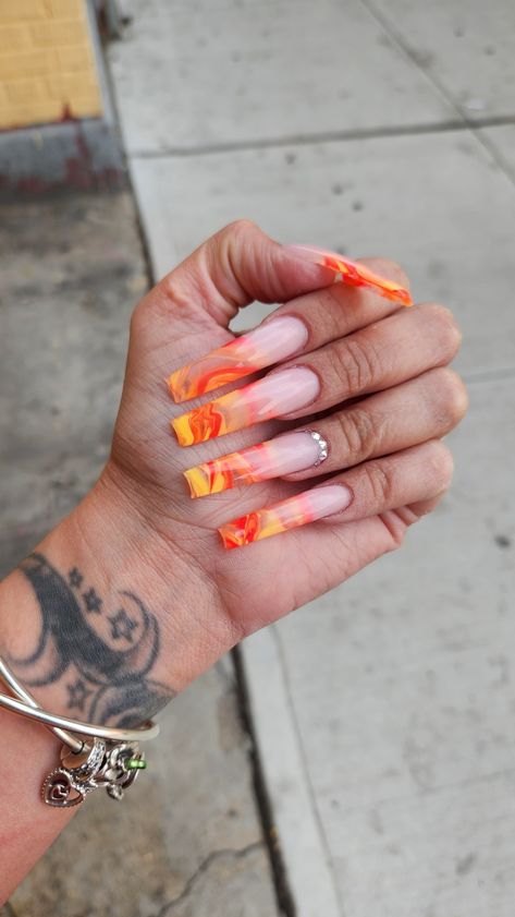 Marble Color Nails, Orange And Green Marble Nails, Yellow Marble Nails Acrylic, Orange And Yellow Marble Nails, Red And Orange Marble Nails, Spring Coffin Nail Ideas 2024, Red Orange And Yellow Nails, Yellow Red Nails, Red And Yellow Nail Designs