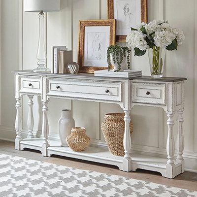 Elevate your space with the traditional 72-inch hall console table. Crafted of poplar solids with white oak and birch veneers this piece features an antique white finish with a weathered brown whitewash top, three full extension drawers and a bottom shelf for additional storage. This timeless console table will make a wonderful addition to your traditionally styled home. | One Allium Way 56 Inch Hall Console Table Liberty 244-AT2001 Brown/White 32.0 x 72.0 x 12.0 in, Wood | FMOE3874 | Wayfair Ca Rustic Entryway Table, Hall Console, White Console Table, Farmhouse Console Table, Rustic Entryway, Hall Console Table, Accent Side Table, Entryway Ideas, Sofa End Tables