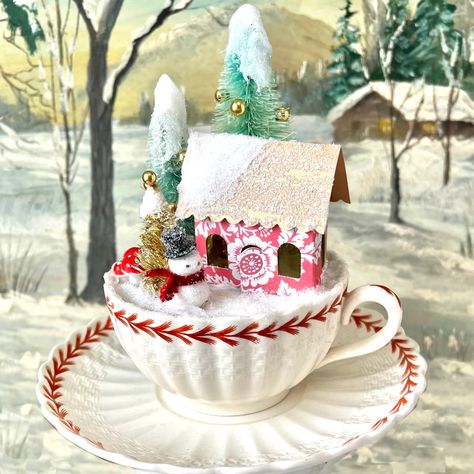 ALMOST GONE! Make this cozy cottage nestling in a gorgeous antique, Spode English teacup. The prettiest little scene you can imagine, compete with a tiny snowman standing outside a tiny paper cottage, surrounded by dyed bottle brush trees, a metallic mylar tree covered in glass glitter snow.  Everything you need to mak Teacup Ideas, Teacup Art, Tiny Snowman, Business Crafts, Flora Frame, Teacup Crafts, Holiday Tea, Wood Snowman, Millinery Supplies