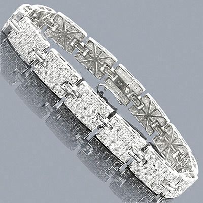 Sterling Silver Bracelets: This Mens Diamond Bracelet in sterling silver weighs approximately 41 grams and showcases 3.97 ctw of pave-set round diamonds. Featuring a versatile design, this is a great budget piece featuring polished sterling silver and genuine diamonds. This men's diamond bracelet is also available in 10K and 14K gold, please contact us for details. Mens Link Bracelet, Gents Bracelet, Mens Diamond Jewelry, Mens Bling, Mens Diamond Bracelet, Expensive Jewelry Luxury, Bracelets Design, Mens Bracelet Silver, Diamond Bracelets