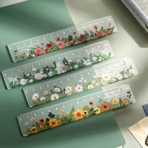 2.89 - USE CODE MAINE23 FOR 10% OFF! Freshen up your stationery collection with this plastic ruler that would vibe well with a cottagecore lifestyle! Showcasing a pressed flower-style print against a clear background, it’s sure to boost your mood during long tutorials. Cottagecore Lifestyle, Roller Design, Boost Your Mood, Gel Ink Pens, Clear Background, Stationery Collection, Beauty Packaging, Cute Stationery, Flower Fashion