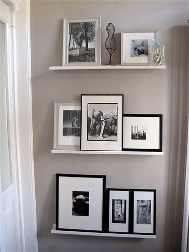 There is a small entrance room before entering the hall and we displayed some black and white photographs there to greet the people coming in   Blogged: moline.typepad.com/moline/2009/03/wall-displays.html Decorating A Narrow Hallway, Ikea Floating Shelves, Koti Diy, Floating Shelves Bedroom, Floating Shelves Kitchen, Floating Shelves Bathroom, Picture Shelves, Regal Design, Floating Shelves Diy