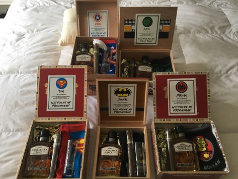 DIY Groomsmen Proposal Boxes (Superhero Theme). We used different cigar boxes and treated each groomsman to a drink, cigar, engraved shot glass, and super hero socks. Gaming Groomsmen Proposal, Marvel Groomsmen Proposal, Video Game Groomsmen Proposal, Groomsmen Proposal Video Game, Groomsmen Proposal Nerdy, Marvel Groomsmen, Superhero Wedding Ideas, Diy Groomsmen Proposal, Avenger Wedding