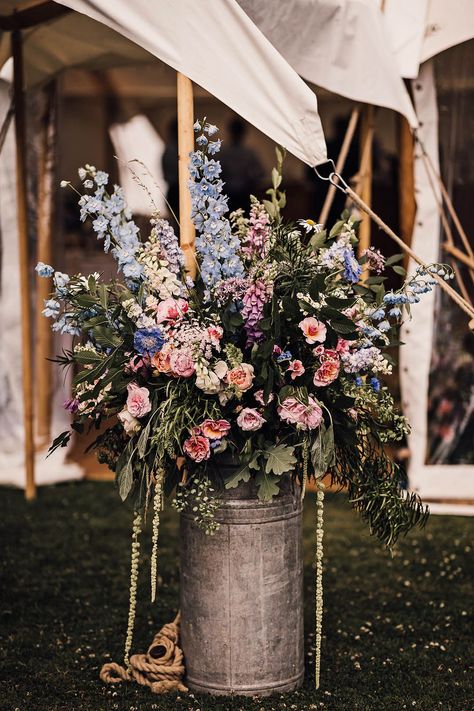 A vintage milk churn full of pink and blue wildflowers for the traditional marquee wedding Pink And Blue Rustic Wedding, Country Flowers Wedding, Wedding Milk Churn, Country Wedding Uk, Marquee Entrance Flowers, Milk Churn Flowers Wedding, Cottage Wedding Flowers, English Country Wedding Theme, Rustic Marquee Wedding