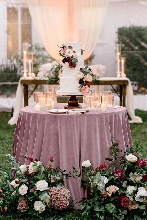 Dusty Rose Head Table Wedding, Rustic Mauve Wedding Decor, Moody Mauve Wedding, Blush Velvet Tablecloth Wedding, Mauve And Red Wedding, Burgundy And Blush Wedding Centerpieces Table Settings, Mauve Sweetheart Table, Colored Tablecloths Wedding, Mauve Wedding Table Decor