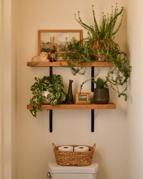 #diyideas #shelves #diys #shelf #shelfdecorating #earthy #plantsmakepeoplehappy #shelfie Boho Wall Shelves Bathroom, Plant Shelf Bathroom, Bathroom Shelf Over Toilet, Restroom Plants Decorating Ideas, Diy Bathroom Shelf Above Toilet, Restroom Interior Design, Bathroom Plant Shelf, Earth Tone Half Bath, Boho Bathroom Shelves