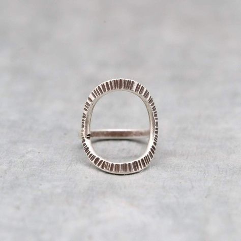 Get ready to add an elegant touch to your look with this beautifully handcrafted oxidized silver ring. This unique piece features a hammered texture and an open circle design, making it the perfect accessory for any occasion. Perfect as a holiday gift! 💍🎁 #KarmaJewelry #Handcrafted #OxidizedSilver #UniqueDesign #HolidayGift #FashionStatement #SilverRing #GiftIdeas #Accessorize #SilverAccessories #MadeInIndia #Engagement #MothersDay #Graduation #ConfirmationCommunion #Anniversary #Birthday ... Simple Stone Ring, Hammer Texture Ring, Karma Jewelry, Oxidized Ring, Hammered Band, Hill Tribe Silver, Sterling Silver Rings Bands, Sterling Silver Jewelry Handmade, Textured Ring