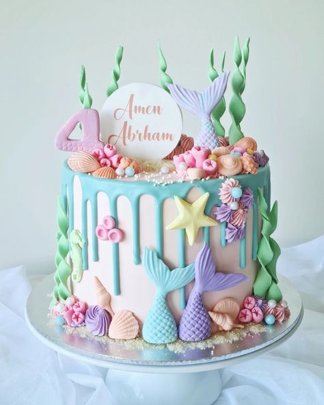 A very cute mermaid pastel cake for 4 year old Amen 🪸🧜‍♀️🐚 #mermaidcake #cutemermaid #undertheseacake #mermaidmagic #oceancake #mermaidparty #cakedecorating #sweetmermaid #cakeart #mermaidtail #cakeinspiration #adorablecakes #sunshine #deerpark #derrimut #essendon #tullamarine #ascotvale #niddrie #keiloreast #keilor #moneeponds #flemington #ravenhall #pointcookcakes #pointcook #sanctuarylakes Mermaid Layer Cake, Mermaid Shark Cake, Two Year Old Cake, Ariel Mermaid Cake, Mermaid Cake Ideas, Ocean Birthday Cakes, Little Mermaid Birthday Cake, Mermaid Birthday Cake, Little Mermaid Cake