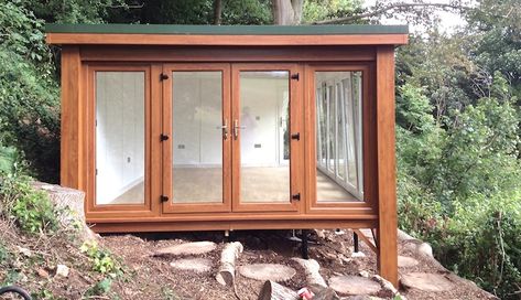 I imagine something smaller but somewhat similar to this for the shed on the slope (but with a patio on top). Treehouse Construction, Garden Log Cabins, Backyard Cabin, Office Shed, Top Farm, Studio Shed, Tree House Kids, Sloped Garden, Backyard Office