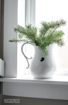 Farmhouse window with chippy white pitcher with evergreen branches for Christmas decorating / www.funkyjunkinteriors.net Beach Inspired Decor, Minimalist Christmas Decor, Farmhouse Window, White Pitcher, Christmas Bathroom Decor, Farmhouse Windows, Christmas Bathroom, Shabby Chic Bathroom, Christmas Decorations Diy Outdoor