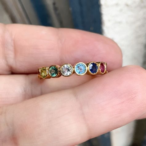 This luxury natural gemstone rainbow ring is now available to order 🛍️ Light citrine Dark citrine Peridot Alexandrite Aquamarine Blue Topaz Blue Sapphire Ruby Pink Tourmaline Tanzanite Here’re few ideas 💡 ◾ A proposal ring after 10 years (or 10 months, hehe) of knowing each other ◾ A unique wedding band, that joyfully embraces readiness for life endeavor ◾ A 10th anniversary ring ◾ A family ring of 10, i.s. a mother’s or grandmother’s ring What else?🤔 Drop your suggestions in comment... Family Ring, Unique Wedding Band, Rainbow Ring, Family Rings, S Ring, Rainbow Rings, Unique Wedding Bands, Proposal Ring, 10 Anniversary