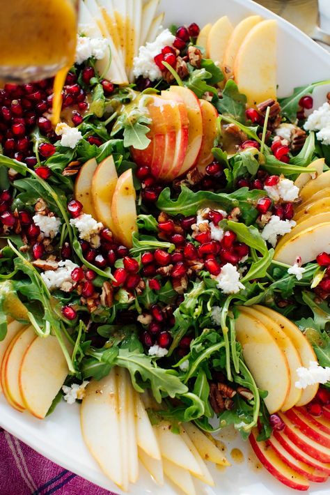 This gorgeous holiday-colored green salad is easy to make. Made with fresh pomegranate, pear, apple and arugula, it will really brighten up your table! #healthysalad #saladrecipe #pomegranatesalad #pearsalad #holidaysalad #cookieandkate Pomegranite Salad, Pear Green Salad, Salad With Ginger Dressing, Holiday Salad, Christmas Salad Recipes, Christmas Salad, Holiday Salads, Christmas Salads, Pomegranate Salad