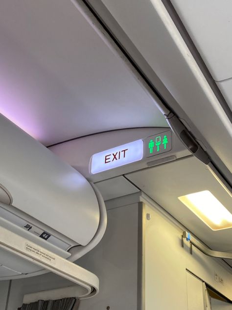 airplane + bathroom sign + exit + airport aesthetic Airplane Bathroom, Airport Security Aesthetic, Airport Bathroom, Airplane Interior Aesthetic, Exit Sign Aesthetic, Airplane Interior, Airplane Window View, Reading Romance Novels, Airport Aesthetic