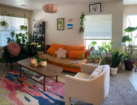 colorful decor maximalist fun girly orange couch green chair Pink chair house plantS Green Couch Pink Chair, Pink Orange Blue Green Bedroom, Green Orange And Pink Living Room, Green Couch Maximalist, Pink Apartment Decor, Blue Green Bedrooms, Maximalist Living Room, Pink Apartment, Seattle Apartment