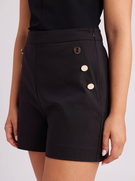 RE24PA021 in Black. Length: 40.5cm. Discover timeless elegance with the Verona Short. Impeccably tailored in structured fabric, these high-waisted shorts offer a slight stretch for comfort. A side zip ensures a seamless silhouette, while soft gold feature buttons add a touch of opulence. In classic black, they exude sophistication, complete with non-functional pockets for a sleek finish. Denim Short Jumpsuit, Structured Fabric, Review Australia, Lace Evening Dresses, Cardigan Top, Knitwear Cardigan, Skorts, Denim Pant, Cocktail Dress Party