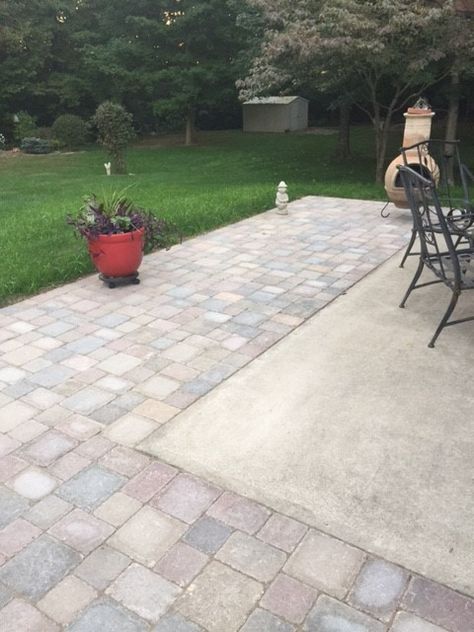 Extending concrete patio with pavers Concrete Patio Paver Border, Paver Extension Patio, Concrete Patio With Paver Extension, Paver Patio Next To Concrete, Cement And Paver Patio, Pavers To Extend Concrete Patio, Concrete To Pavers Transition, Concrete And Paver Patio Ideas, Pavers Around Patio