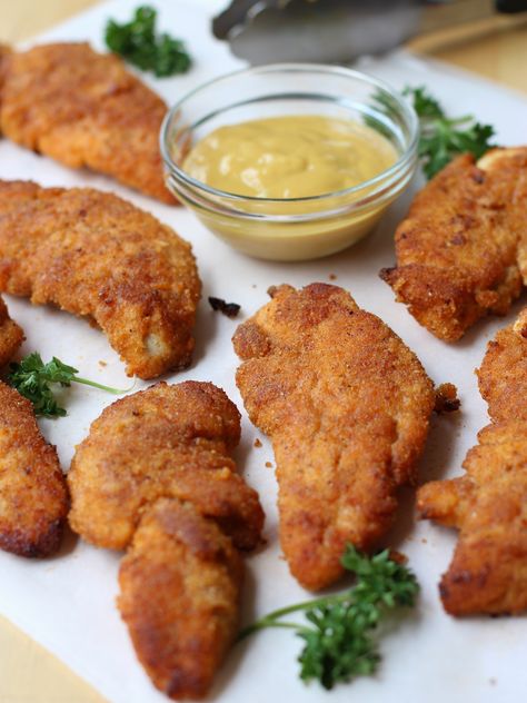 Spicy Baked Chicken Tenders Chicken Tender Recipes Baked, Spicy Chicken Tenders, Breaded Chicken Strips, Spicy Baked Chicken, Chicken Tenders Recipe, Chicken Tenderloin, Chicken Tenderloin Recipes, Baked Chicken Tenders, Chicken Tender Recipes