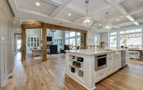 Nantucket - Infinity Custom Homes Painted Garage Walls, Cabinets With Crown Molding, Infinity Homes, Herringbone Tile Floors, Custom Shower Doors, Herringbone Wall, Shingle Exterior, Kitchen Gallery, Brick Facade