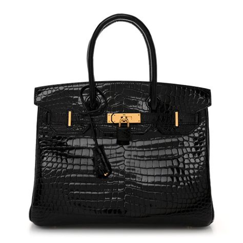 This is the authentic HERMES Shiny Porosus Crocodile Birkin 30 in Black.  This stunning Hermes Birkin is crafted of polished exotic crocodile in black.  The bag features rolled crocodile top handles and a matching cross over flap with a horizontal cross strap closure with a polished gold turn lock closure and a hanging key clochette and crocodile lined padlock.  The turn lock opens to a matte goatskin interior with zipper and patch pockets. Birkin Purse, Black Birkin Bag, Hermes Crocodile Bag, Birken Bag, Birkin 30 Black, Expensive Bag, Birkin 30, Crocodile Bags, Girly Bags