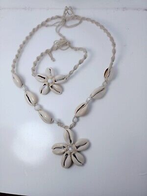 Hawaiian Jewelry All Cowry Shell Plumeria Flower White Necklace.Special and beautiful design makes you attract the attention of others. 
 

Great gift for your friends or your family. 
 

Specifications: 
 

Material: Shell, Beads, Alloy 

Feather: High Quality 

Style: Bohemia 

Shape: Shells White Cowrie Shell Choker As A Gift, White Shell-shaped Choker For Vacation, Hawaiian Shell Jewelry, Hawaii Necklace Flower, Hawaiian Necklace Flower, Cowry Shell, Hawaiian Jewelry, White Necklace, Silver Bracelets