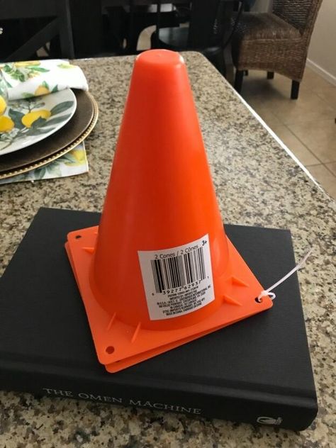 As many of you already know, I absolutely love browsing the Dollar Tree in search of unusual items to use for crafting. Many of my fun crafts can be seen on my Facebook page- Gilbert Marketplace. So today, I came across the best item to be used for some Halloween witch hats- yep traffic cones! Check out what I did. Things I used for my hat are Rick rack white ribbon 4” 1 yard for brim glue sticks construction cones ( toy Dept) ribbon scissors plastic spider Flat black spray paint f… Dollar Store Witches Hat, Dollar Tree Witches Hat Wreath Form, Dollar Tree Witch Hat Wreath Christmas, Halloween Hats Diy, Cheap One-size Halloween Hats, Ward Activities, Spray Paint Plastic, Witch’s Hat Wreath, Topiary Diy