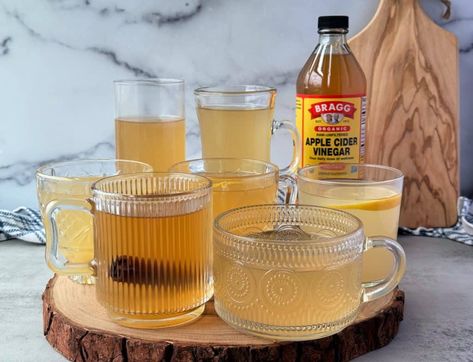 These easy apple cider vinegar drinks are all made using organic apple cider vinegar as the main ingredient. Apple cider vinegar detox drinks and tea recipes . Whether you are looking for a refreshing apple cider vinegar and lemon water drink, or a warm comforting tea, I have a wide variety of apple cider vinegar drinks for you all here in one place. #applecidervinegardrinks #acvdrinkrecipes #applecidervinegar Apple Cider Vinegar Cleanse, Apple Cider Vinegar Tea, Electrolyte Drink Recipe, Coconut Water Drinks, Recipe Using Apples, Apple Cider Vinegar Lemon, Make Apple Cider Vinegar, Cinnamon Drink, Apple Cider Vinegar Detox Drink