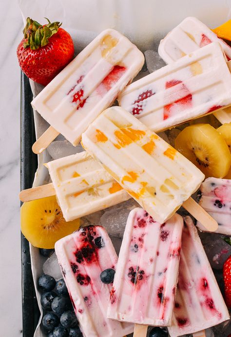 4-Ingredient Fruit & Yogurt Popsicles | The Woks of Life Fruit Themed Snacks, Frozen Fruit And Yogurt Popsicles, Best Popsicle Recipes, Homemade Yogurt Popsicles, Fruit Popsicles For Kids, Healthy Popsicles Recipe, Frozen Popsicle Recipes, Popsicle Recipes For Kids, Fruit Popsicle Recipes