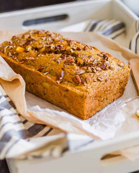 Transform your baking with this spiced carrot bread recipe! Made with whole wheat flour, carrot juice, fresh mango, and warm spices like cinnamon and ginger, it's a nutrient-packed delight. Perfect for breakfast, snacking, or dessert, this bread combines the best of carrot cake and banana bread. Moist, tender, and naturally sweetened with coconut sugar, it’s a versatile treat. Add pecans or customize with your favorite spices. Carrot Bread Recipe Moist, Whole Wheat Carrot Cake, Banana Bread Moist, Carrot Bread Recipe, Carrot Bread, Healthy Carrot Cakes, Loaf Cakes, Cheese Topping, Main Dish Salads