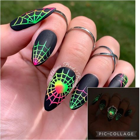 "Neon Spider Webs Press on Nails Model: Medium almond Please read full description below. This set features:  Neon spiderwebs on a matte black background Glow in the dark spider webs Gel polish. I offer quality handcrafted press on nails designed with quality gel polish. This set will give you a perfect manicure within a few minutes for a small portion of the salon cost.  Sets come with 10 nails (based on the size/shape selected), nail prep kit, and instructions. Reusable if removed correctly. 1 Goth Summer Nails 2024, Glow In The Dark Black Nails, Spooky Halloween Nails Glow In The Dark, Black And Bright Nails, Neon Goth Nails, Halloween Glow In The Dark Nails, Glow In The Dark Nails Designs, Black And Neon Nails, Neon Halloween Nails