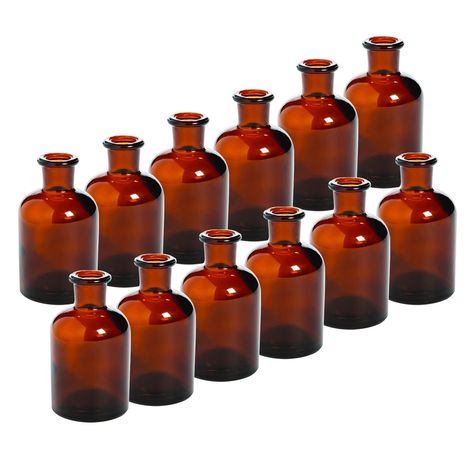 PRICES MAY VARY. Give your next event a hint of vintage flair with these vases. The amber colored glass will look great as part of a centerpiece at any wedding reception, event, or party. You can even display these at home for a classy addition to your home décor. Use them as a vase for flowers or fill them with any decorative item that fits your theme. Glass. Holds approx. 5 oz. (12 pcs. per unit) 4" x 2 1/4" diam. Fall Wedding Tables, Glass Bud Vases, Burnt Orange Weddings, Vase For Flowers, Fall Wedding Centerpieces, Large Wedding, Wedding Vases, Wedding Table Decorations, Wedding Table Settings