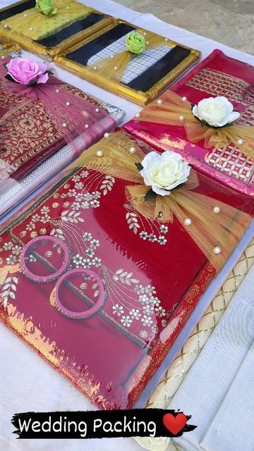 Sadi Packing For Wedding, Sadi Packing Ideas, Saree Decoration Ideas Wedding, Suit Packing Ideas, Suit Packing Ideas Wedding, Saree Packing Ideas Wedding Gift Packaging, Dress Packing Ideas Wedding, Saree Packing Ideas, Saree Packing Ideas Wedding