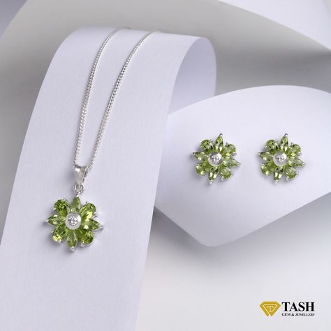 Eternal Spring Set Brighten your look with this enchanting flower jewelry set, adorned with natural peridot gemstones. The August birthstone, peridot, is beautifully set in pure silver, creating a captivating pendant and earring set. Perfect for any occasion, it symbolizes growth and renewal. Add this timeless piece to your collection with Tash Gem & Jewellery. ☑️ Lifetime Warranty. ☑️ Islandwide Delivery. ☑️ Authorized dealer from National Gem & Jewellery Authority. Contact us for more d... Pendant And Earring Set, Spring Set, August Birthstone, Peridot Gemstone, Flower Jewelry, August Birth Stone, Gems Jewelry, Flower Jewellery, Pure Silver