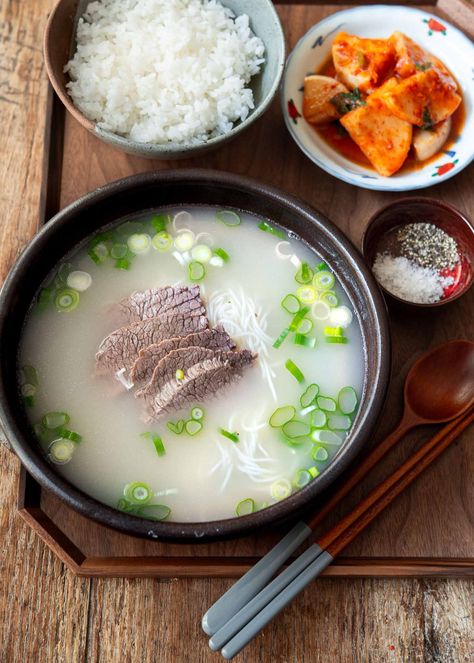 Seolleongtang, or Korean beef bone soup, is a nourishing dish rich in nutrients from ox bones. Traditionally, it takes up to 2-3 days to prepare, but an Instant Pot cuts this to just a few hours, retaining its rich flavor in milky white broth. Seolleongtang Recipe, Korean Bone Broth Soup, Soup Bones Beef Recipe, Bone Soup Recipes, Ox Bone Soup, Cardamom Bread Recipe, Beef Bone Soup, Radish Kimchi, Asian Soups