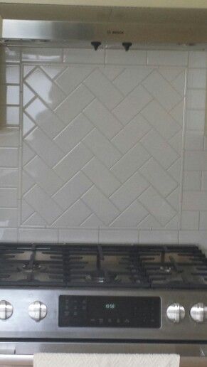 I saw this on Pinterest and liked it. Close up of subway tile detail behind stove. Tile Pattern Behind Stove, Subway Tile With Accent Strip Kitchen, Subway Tile Behind Stove, Herringbone Tile Behind Stove, Herringbone Backsplash Behind Stove, Accent Backsplash Behind Stove, Accent Tile Behind Stove, Behind Stove Backsplash Ideas, Kitchen Backsplash Behind Stove