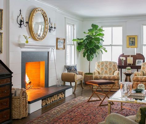 Such an inviting room by Carol Flanagan Interior Design. Love the firewood storage--Nice to see our Sophia sconces too! @carolflandesigns ⠀ #handforgediron #livingroomstyle #sconces #handfinished #customlighing #sconce #lightinginspo #handforged #ironware #ironwareinternational #handfinished #blacksmith #greenwichct #artisans #fireplacestyle #madeinfrance🇫🇷 Ironware International (@ironwareinternational) • Instagram photos and videos Fireplace Style, Made Bed, Room Styling, English Decor, Firewood Storage, Live In Style, Brown Furniture, Vintage Blanket, Decoration Inspiration