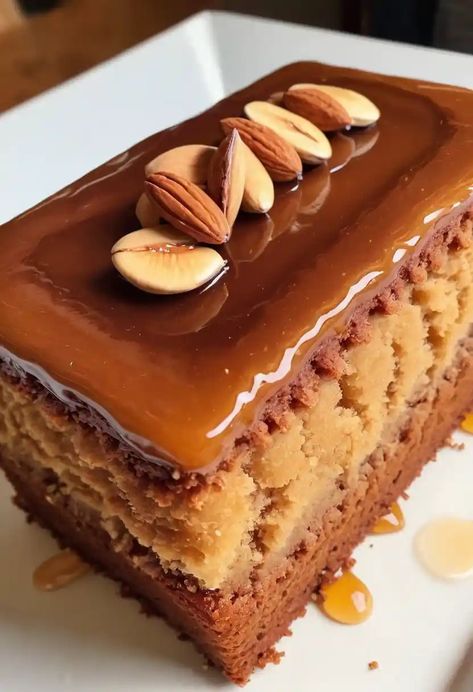 Honey Almond Cake Recipe

Ingredients

- 1 cup almond flour
- 1 cup all-purpose flour
- 1/2 cup honey
- 1/2 cup sugar
- 1/2 cup unsalted butter, softened
- 3 large eggs
- 1/4 cup milk
- 1 teaspoon baking powder
- 1/2 teaspoon baking soda
- 1/4 teaspoon salt
- 1 teaspoon vanilla extract

Full Cooking Instructions on... Desserts Made With Honey, Honey Almond Cake, Honey Recipes Dessert, Almond Flour Cakes, Honey Cake Recipe, Dinner Ideas Recipes, Almond Cake Recipe, Applesauce Cake, Honey Almonds