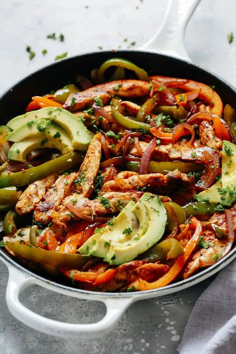 This tasty skillet chicken fajitas are an easy weeknight one-pan meal for the whole family. This Tex-Mex favorite has healthy protein and fresh veggies all in one amazing yet simple dish. #chickenfajitas #skilletchickenfajitas #fajitas Lasagna Primavera, Trout Dinner, Skillet Chicken Fajitas, Cauliflower Muffins, Loaded Salad, Healthy Chicken Fajitas, Turkey Skillet, Vegetable Skillet, Shrimp Asparagus