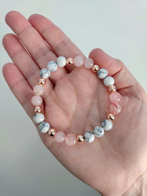 Absolutely stunning! This gorgeous gemstone bracelet features natural Rose Quartz, White Howlite and Rose Gold Hematite beads.  Beads are 8mm and 4mm. Bracelet stretches to fit. Coral Beaded Bracelets, Natural Bead Bracelets, Natural Beads Bracelet, Stone Beads Bracelets, Crystal Bead Bracelet Ideas, Bracelet Product Photography, Stone Bracelet Ideas, Crystal Bracelet Ideas, Bracelet Images