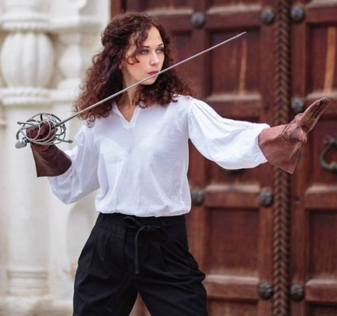 Swordswoman with wire hilt rapier. Women Drawing Poses Reference, Poses With Rapier, Fencing Poses Drawing, Women With Swords Reference, Swordplay Drawing Reference, Rapier Pose Dynamic, Swordfighting Poses, Holding Rapier Reference, Rapier Character