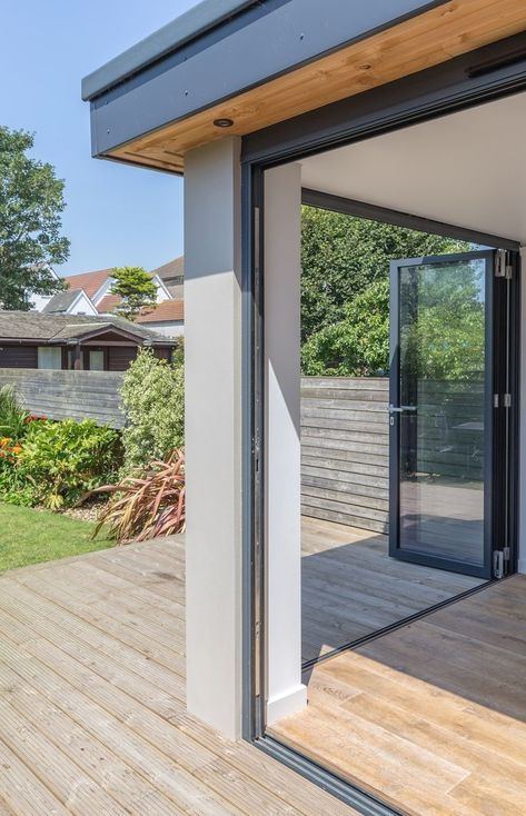 #interiordesign #patios #doors. Extension Veranda, Flat Roof Design, Flat Roof Extension, Garden Room Extensions, Bifold Door, Roof Overhang, Roof Extension, Room Extensions, House Extension Design