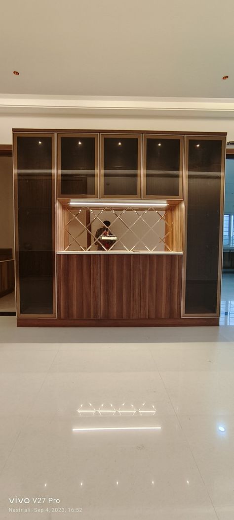 Glass interior solution Crockery Unit Mirror Design, Fluted Glass Crockery Unit, Glass Crockery Unit Design Modern, Brown Tinted Glass Wardrobe, Crockery Cabinet Design Dining Rooms, Glass Crockery Unit, Crockery Units Modern, Crockery Unit Design Dining Rooms, Glass Wardrobe Design