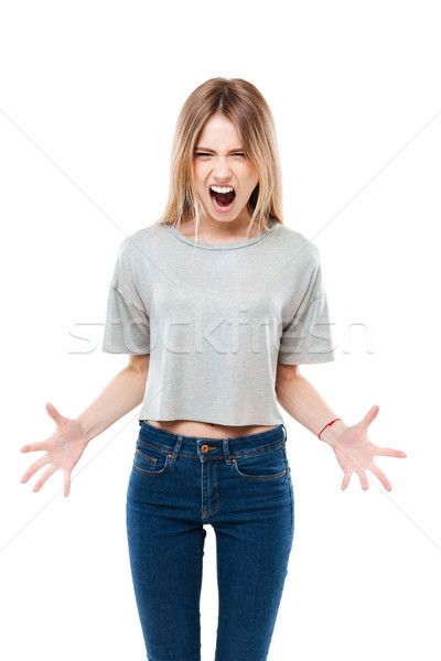 Portrait of a young angry woman standing and screaming stock photo (c) deandrobot (#8475484) | Stockfresh Thumbs Up Hand Reference, Thumbs Up Pose Reference, Thumbs Up Drawing Reference, Thumbs Up Reference, Thumbs Up Pose, Thumbs Up Drawing, Angry Woman, Photoshoot Moodboard, Angry Expression