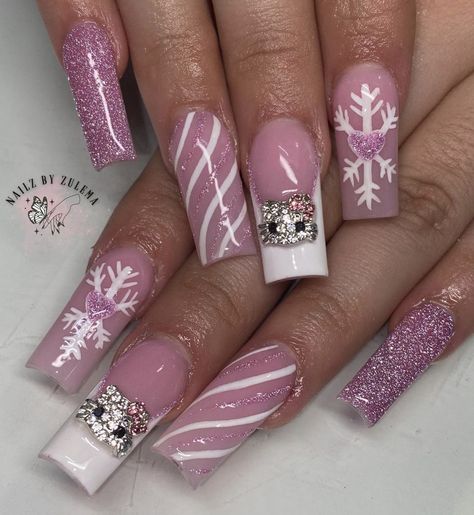 Nails Christmas Hello Kitty, Nails Design Christmas Holiday, Acrylic Nails For Christmas Holiday, Pink Christmas Short Nails, Acrylic Nails With Hello Kitty Charms, Pink Snow Nails, Hello Kitty Christmas Nails Short, Pink Hello Kitty Christmas Nails, Mcbling Christmas Nails