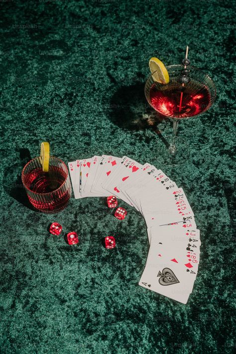 A table topped with cards and a drink photo – Gambling Image on Unsplash Cards Photoshoot, Casino Food, Gambling Table Aesthetic, Vintage Poker Aesthetic, Gambling Aesthetic Vintage, Gambling Photography, Playing Cards Photography, Gambling Aesthetic, Dice Aesthetic