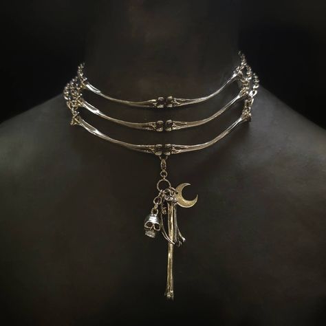 "Lead-free pewter cast chicken bone chokers. Each bone bar is 4\" x ¼\" Adjustable 14\" - 16\" Pendant options: 1. Hummingbird skull 1¾\" 2. Pentagram/moon 1½\" 3. Inverted Pentagram/ cross 1½\" 4. Snake bones/moonstone 3½\" 5. Skull/bone/claw/moon 2¾\" 6. Owl claws/larimar 3½\" 7. Sealife 1¾\" (#4 & #6 are limited stone quantities) 8. Succulent leaf/twig/succulent blossom 9. Succulents/moon/cypress Interchangeable pendants so you can collect and add more pendant designs. Click link for Versions Bones Jewelry, Bone Accessories, Hummingbird Skull, Wicca Jewelry, Bone Necklace, Bone Jewelry, Jewelry Pins, Funky Jewelry, Pendant Design