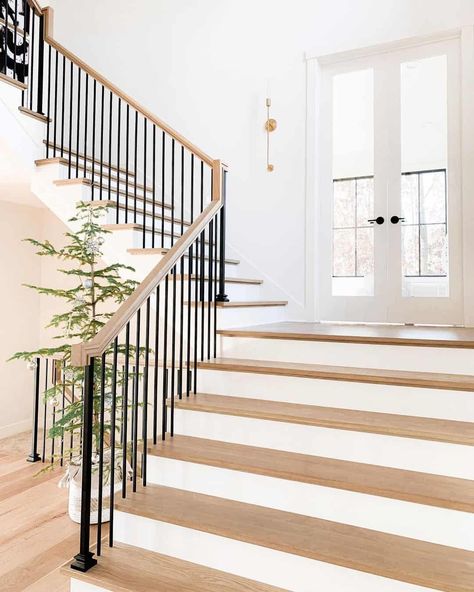 Black Metal Spindles, Stair Riser Ideas, Stairs Library, Stair Landing Ideas, Wrought Iron Stair Spindles, Double French Door, Stair Landing Decor, Painted Stair Risers, White Stair Risers