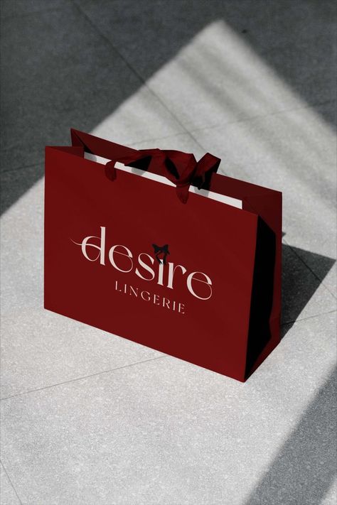 Packaging bag for Desire Lingerie. #lingerie #illustrator #logoinspirations #designinspo #visualidentity #identitydesign #packaging #brandingdesign #fashion #desire Lingerie Packaging Ideas, Red Packaging Design, Elegant Shopping Bags With Embroidered Logo, Clothing Brand Instagram Layout, Dark Red Branding, Elegant Shopping Bag With Embroidered Logo, Luxury Red Shopping Bags, Red Shopping Bags With Logo, Lingerie Packaging