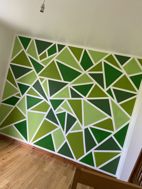 Green triangle wall painted on bots bedroom Painted Triangles On Wall, Painted Triangle Accent Wall, Paint Triangles On Wall, Painting Triangles On Wall, Green Triangle Wall Paint, Geometric Green Wall, Easy Geometric Wall Painting, Geometric Pattern Wall Paint, Triangle Design On Wall