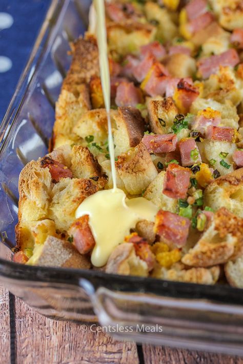 This simple and delicious eggs benedict casserole is one of the easiest breakfast recipes you'll make this year. We seriously love it! #centslessdeals #overnightcasserole #eggsbenny #eggsbenedict #hollandaise #wifesaver #eggsbenedictcasserole Hashbrown Eggs Benedict, Eggs Benedict Casserole Taste Of Home, Wifesaver Breakfast Christmas, Eggs Benedict Casserole With Croissants, Eggs Benedict Breakfast Bake, Eggs Benedict For A Crowd, Easy Eggs Benedict Casserole, Wifesaver Breakfast Casseroles, Wifesaver Breakfast