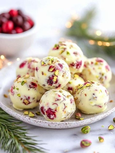 Jamie Oliver Recipes | Cranberry Pistachio White Chocolate Truffles  | Facebook Cooking Cranberries, Pistachio White Chocolate, Christmas Cranberry, Raw Treats, Facebook Recipes, White Chocolate Truffles, Cranberry Pistachio, Candy Truffles, White Chocolate Cranberry